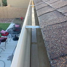 Gutter-cleaning-in-Prescott-valley-with-excessive-debris-from-deteriorating-roof-shingles-Even-treeless-lots-gutters-need-cleaning 0